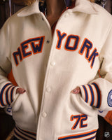 Front embroidery and snap-button detail