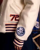 Crest, cuff and founding-year embroidery detail