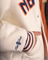 Sleeve embroidery and pocket detail